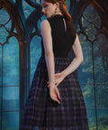 Back view of the Evening Enchantment Fit & Flare Dress featuring a keyhole back, hidden zipper closure, and layered plaid tulle skirt.