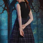 Back view of the Evening Enchantment Fit & Flare Dress featuring a keyhole back, hidden zipper closure, and layered plaid tulle skirt.