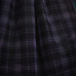 Close-up of the Spellbound Plaid tulle overlay showcasing the layered plaid fabric and soft, airy texture on a ModCloth dress.