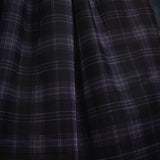Close-up of the Spellbound Plaid tulle overlay showcasing the layered plaid fabric and soft, airy texture on a ModCloth dress.