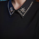 Close-up of the jeweled Peter Pan collar on the Evening Enchantment Fit & Flare Dress featuring sparkling rhinestone embellishments. 