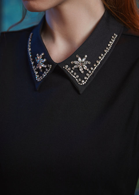 Close-up of the jeweled Peter Pan collar on the Evening Enchantment Fit & Flare Dress featuring sparkling rhinestone embellishments. 