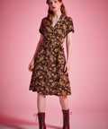 Brown floral shirt dress with contrast piping and rounded notch collar detail