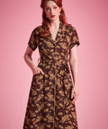 Vintage-inspired brown floral midi shirt dress with full button front and sash belt