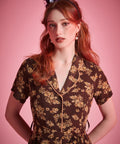 Brown floral viscose shirt dress with full button-front closure and vintage-inspired silhouette