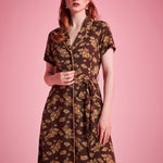 Brown floral dress with removable sash belt and functional pockets for everyday wear