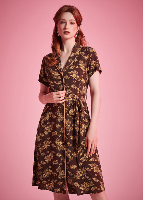 Brown floral dress with removable sash belt and functional pockets for everyday wear