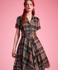 Heritage tartan ModCloth dress with tailored bodice, removable belt, and side pockets