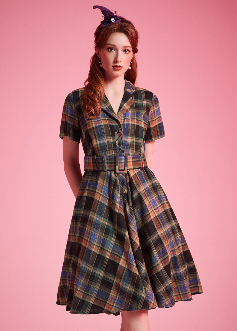 Woman wearing ModCloth Rustic Elegance Casual Dress in Harvest Tartan with removable buckle belt