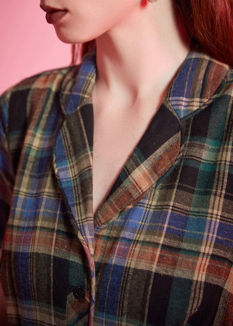 Close-up of notched collar and heritage plaid pattern on ModCloth dress
