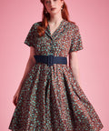 Vintage floral cotton dress with side pockets and contrast navy buckle belt