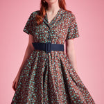 Vintage floral cotton dress with side pockets and contrast navy buckle belt