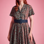 Floral cotton ModCloth dress with contrast piping, removable belt, and side pockets