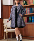 Full-length view of ModCloth purple bat brocade midi coat with vintage-inspired A-line silhouette