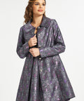 Woman wearing vintage-inspired bat brocade coat with matching dress sold separately