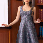 Woman wearing gothic bat print above the knee length dress with sleeveless scoop neckline