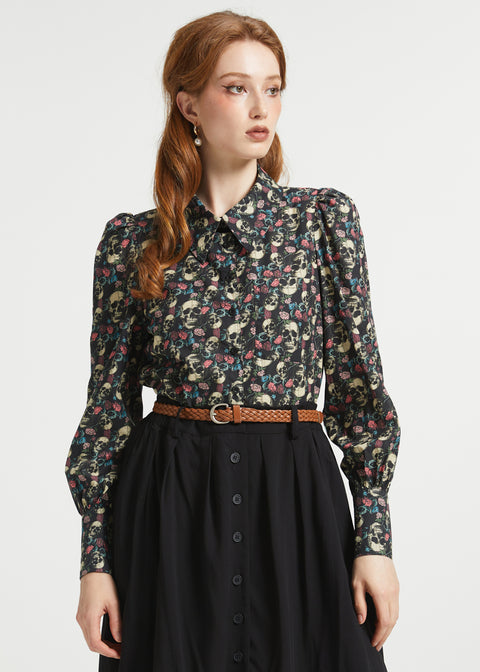 Woman wearing Hoot & Haute cotton blouse in Dead Gorgeous skull floral print