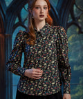 Woman wearing Dead Gorgeous skull print cotton blouse with pointed collar and puff sleeves 