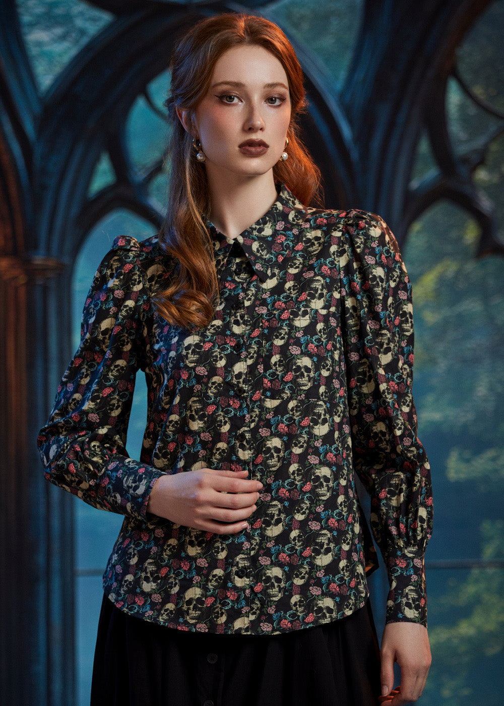 Woman wearing Dead Gorgeous skull print cotton blouse with pointed collar and puff sleeves 