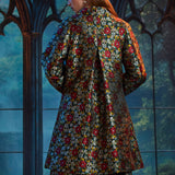 Back view of the Midnight Soirée Dress Coat in Memento Mori highlighting the elegant A-line silhouette and allover floral sugar skull jacquard.