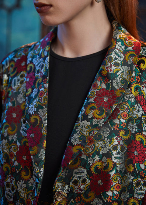 Close-up of the notched lapels on the Midnight Soirée Dress Coat showcasing the intricate floral sugar skull jacquard weave.
