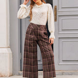 Full length view of woman wearing high waisted Chestnut Plaid culotte pants
