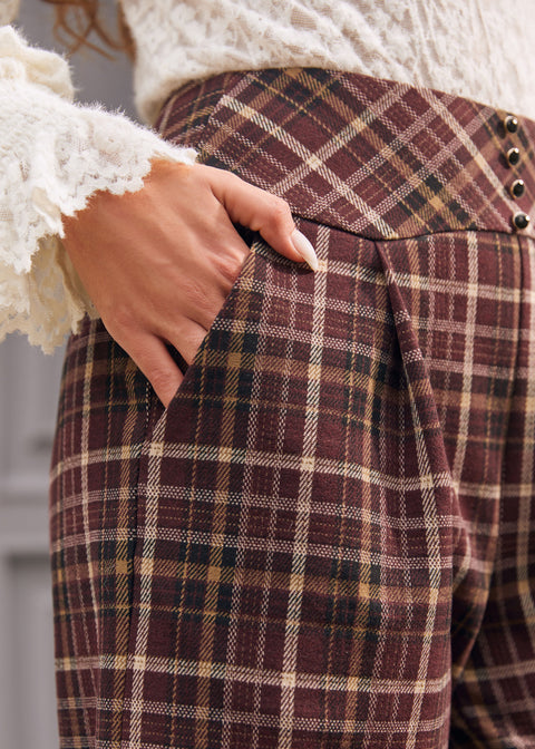 High waisted plaid pants with shaped waistband and decorative metal buttons
