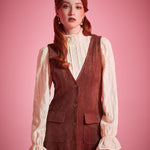 Woman wearing ModCloth button front jumper dress with patch pockets in Autumn Auburn