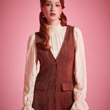 Woman wearing ModCloth button front jumper dress with patch pockets in Autumn Auburn