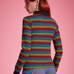 Back view of women's rainbow striped long sleeve polo top with black contrast collar