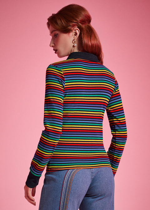 Back view of women's rainbow striped long sleeve polo top with black contrast collar
