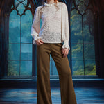 Full-length styling of ivory Victorian lace blouse with wide-leg trousers