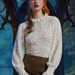 Women's ivory sheer floral lace blouse with long sleeves and ruffled cuffs