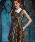 Angled front view of the ModCloth Forever Remembered Dress in Memento Mori showcasing the sleeveless silhouette and vintage-inspired design.