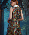 Rear view of the Forever Remembered Dress in Memento Mori highlighting the textured brocade, concealed zipper, and gently flared skirt.