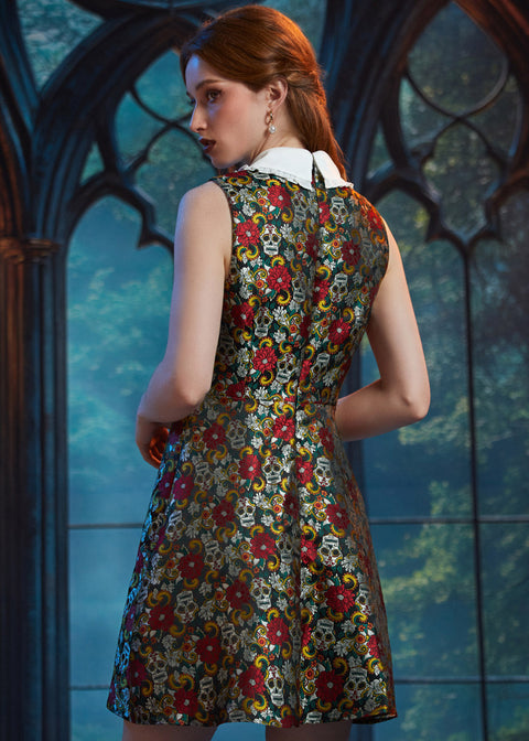 Rear view of the Forever Remembered Dress in Memento Mori highlighting the textured brocade, concealed zipper, and gently flared skirt.