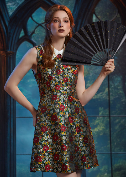 Woman wearing the ModCloth Forever Remembered Dress styled with a black folding fan for an elegant special occasion look.