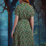 Back view of ModCloth Going Out And About midi dress in Toadally Bewitched with vintage-inspired silhouette.