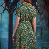 Back view of ModCloth Going Out And About midi dress in Toadally Bewitched with vintage-inspired silhouette.