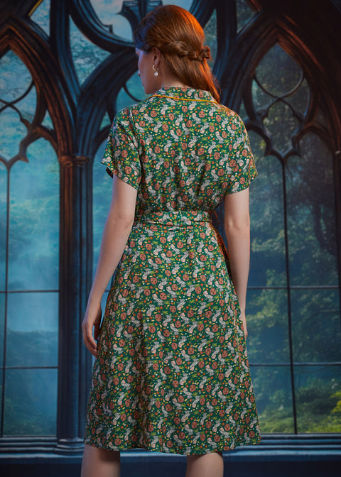 Back view of ModCloth Going Out And About midi dress in Toadally Bewitched with vintage-inspired silhouette.