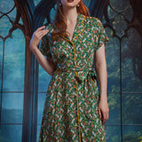 Woman modeling button-front midi dress with removable fabric belt and whimsical frog print.