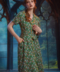 ModCloth Toadally Bewitched midi dress featuring mushroom hat frogs, jack-o-lanterns, contrast piping, and full button front.
