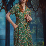 ModCloth Toadally Bewitched midi dress featuring mushroom hat frogs, jack-o-lanterns, contrast piping, and full button front.