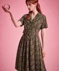 Woman wearing ModCloth Rustic Elegance Casual Dress in Moss & Meadow with removable buckle belt