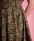 Matching buckle belt detail on olive floral ModCloth dress
