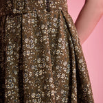 Matching buckle belt detail on olive floral ModCloth dress