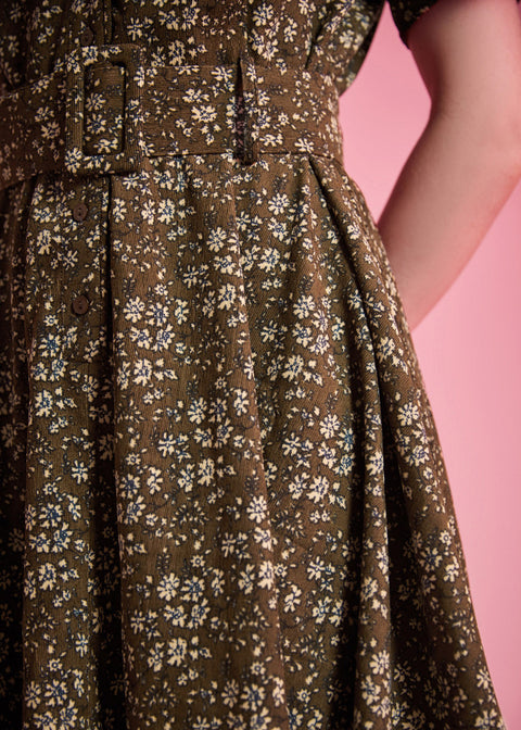 Matching buckle belt detail on olive floral ModCloth dress