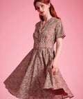 Woman wearing ModCloth Rustic Elegance Casual Dress in Cranberry Cottage with removable buckle belt