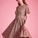 Woman wearing ModCloth Rustic Elegance Casual Dress in Cranberry Cottage with removable buckle belt