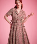 Burgundy floral ModCloth dress with tailored bodice, side pockets, and removable belt